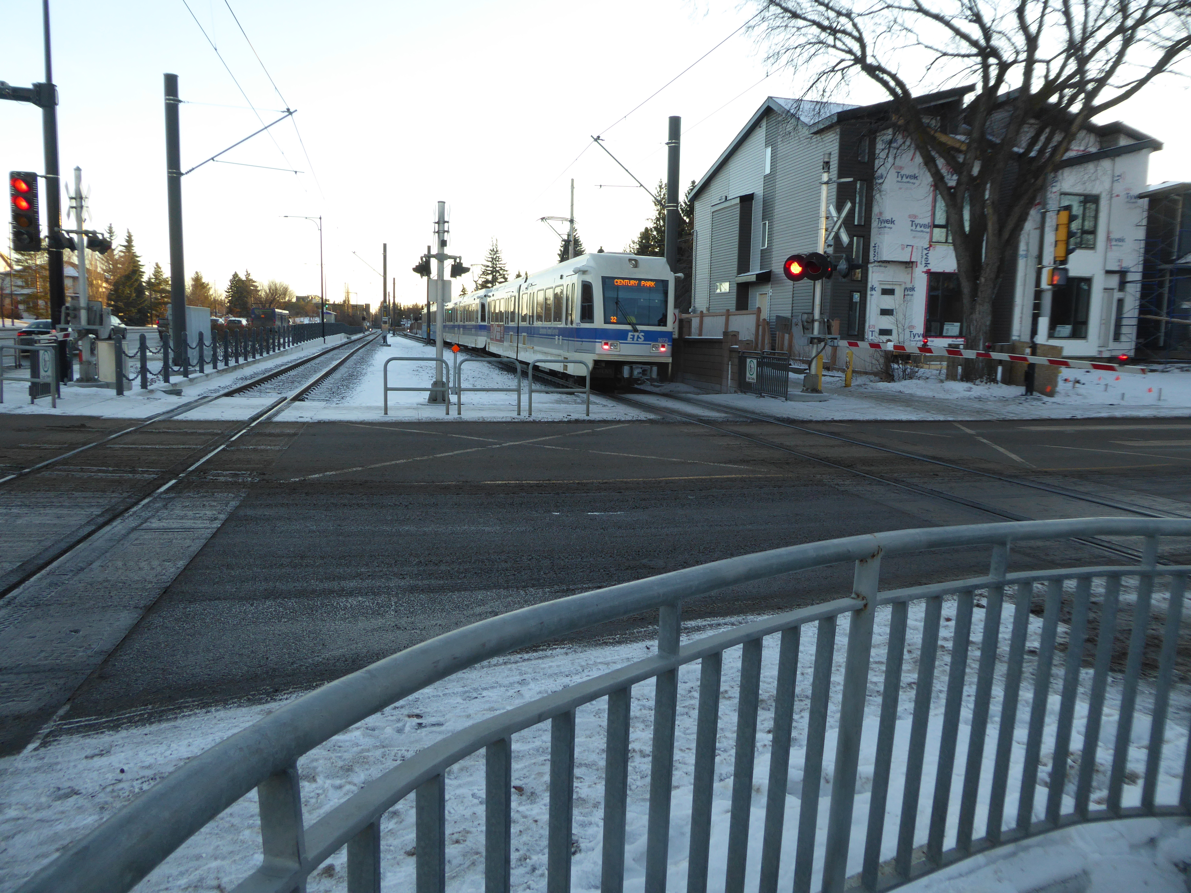 Train approaching railway crossing in Canada
